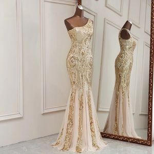 Mermaid one shoulder beaded evening gown